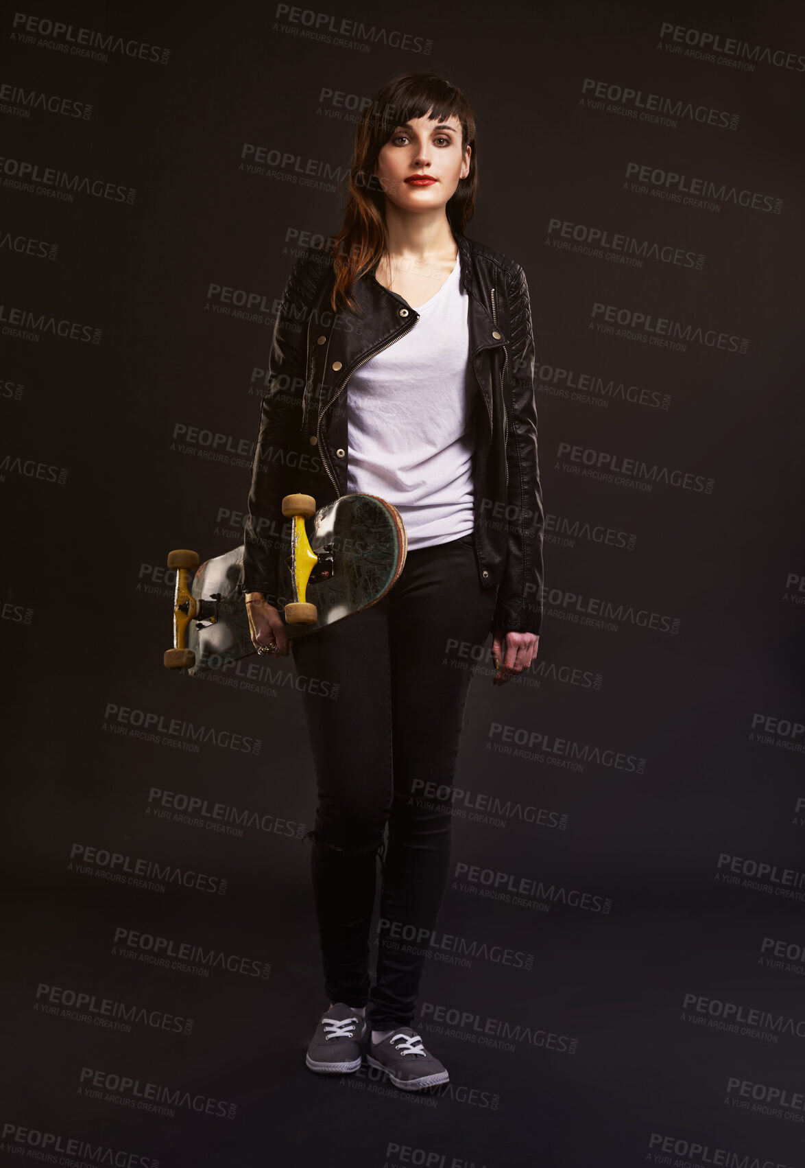 Buy stock photo Studio, portrait and woman with skateboard in hand for fashion, punk clothes and grunge style. Skater, confidence and person with tattoos for satisfaction, rebel and gen z on black background