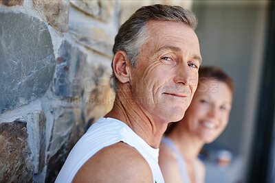 Buy stock photo Fitness, portrait and smile with mature couple outdoor on brick wall for running or training together. Exercise, cardio and face of man with woman at start of daily workout routine to improve health