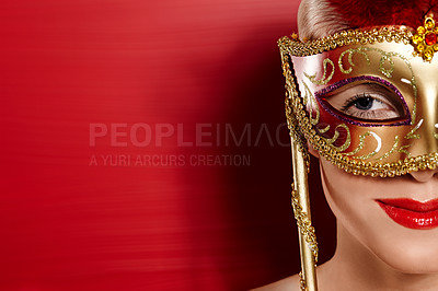 Buy stock photo Portrait, smile and woman in carnival mask for fun, art deco and dress up by red background. Happiness, female person and mysterious or playful with confidence for mockup in studio with lipstick