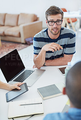 Buy stock photo Discussion, planning and team of creative business people in meeting for brainstorming startup ideas. Group, collaboration or strategy for software development with web designer in top view on laptop