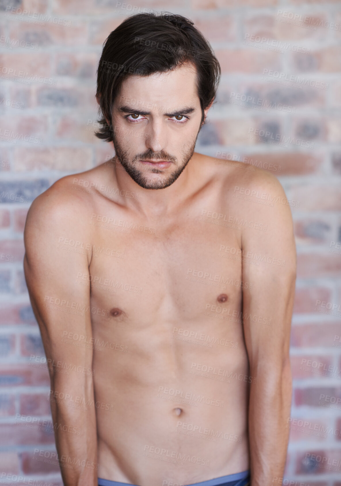 Buy stock photo Shirtless, man and portrait in home with tattoo, skincare or confidence on brick wall in apartment. Male, model and ink on body with topless person in house with pride and calm energy in morning