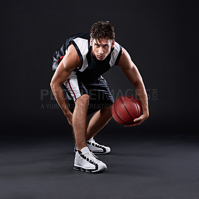 Buy stock photo Sports, man and basketball player with ball for skill training, exercise and workout isolated in studio. Fitness, male person and athlete for game practice and match warm up with black background