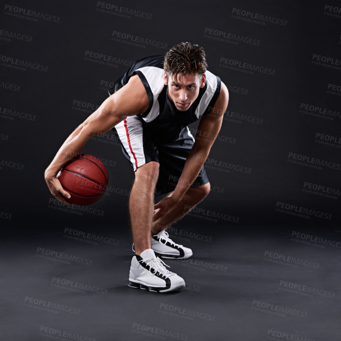 Buy stock photo Basketball, exercise and portrait of man in studio for training, workout and healthy body fitness isolated on black background. Sports, player and athlete dribble ball for competition, game or mockup