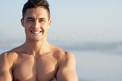 Buy stock photo Fitness, happy and portrait of man on beach for workout, exercise and training outdoors for surfing. Nature, crossed arms and confident person by space and ocean for wellness, health and water sports