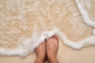 Buy stock photo Above, water and feet in sea, sand and closeup of person, nature and waves in coastline and summer. Outdoor, relax and zen in vacation, holiday and break in weekend, beach or sun in California