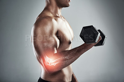 Buy stock photo Man, dumbbell and elbow pain in studio, profile and bone for weightlifting, power or health by white background. Person, bodybuilder and red glow for injury, overlay and accident for joint in workout