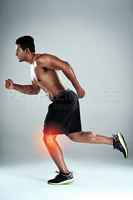 Buy stock photo Running, fitness and man in studio with knee pain, physio and cramp at gym workout for body builder training. Exercise, risk and male athlete with muscle injury, health or ache on white background