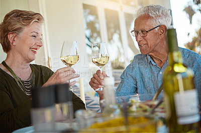 Buy stock photo Love, celebration and senior couple with wine toast on patio for anniversary, event or birthday party brunch. Food, happy and old people at an outdoor restaurant with retirement, cheers or bonding