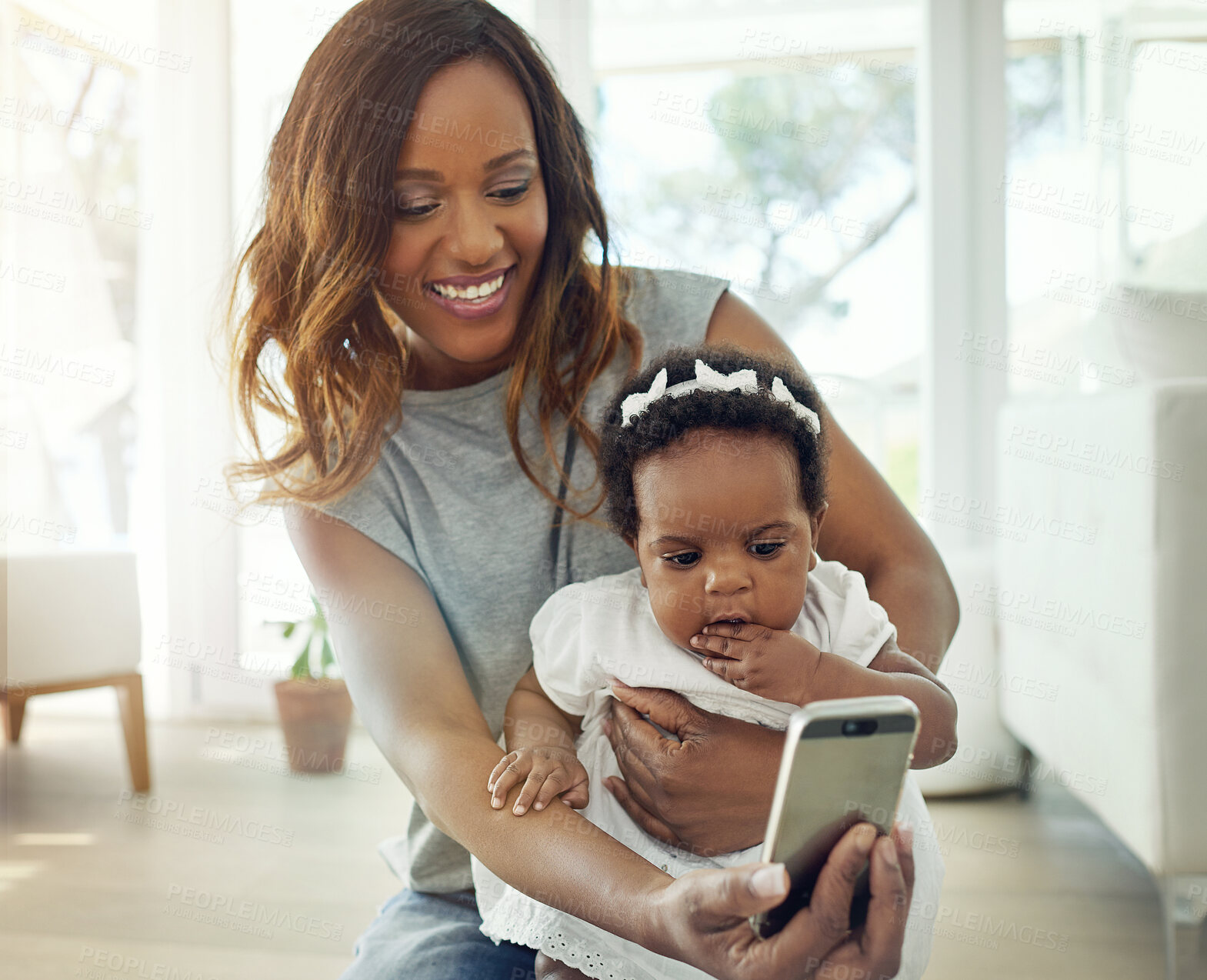 Buy stock photo Mother, selfie and baby in house for happiness, social media and bonding together with smile. Black woman, child and family memory in home for internet post, love and profile picture with relax time