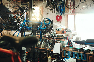 Buy stock photo Bicycle, equipment and garage for repair shop, small business and maintenance of bike, steel and metal. Workshop, tools and upgrade of tire, store and service for brakes, startup and gear to fix