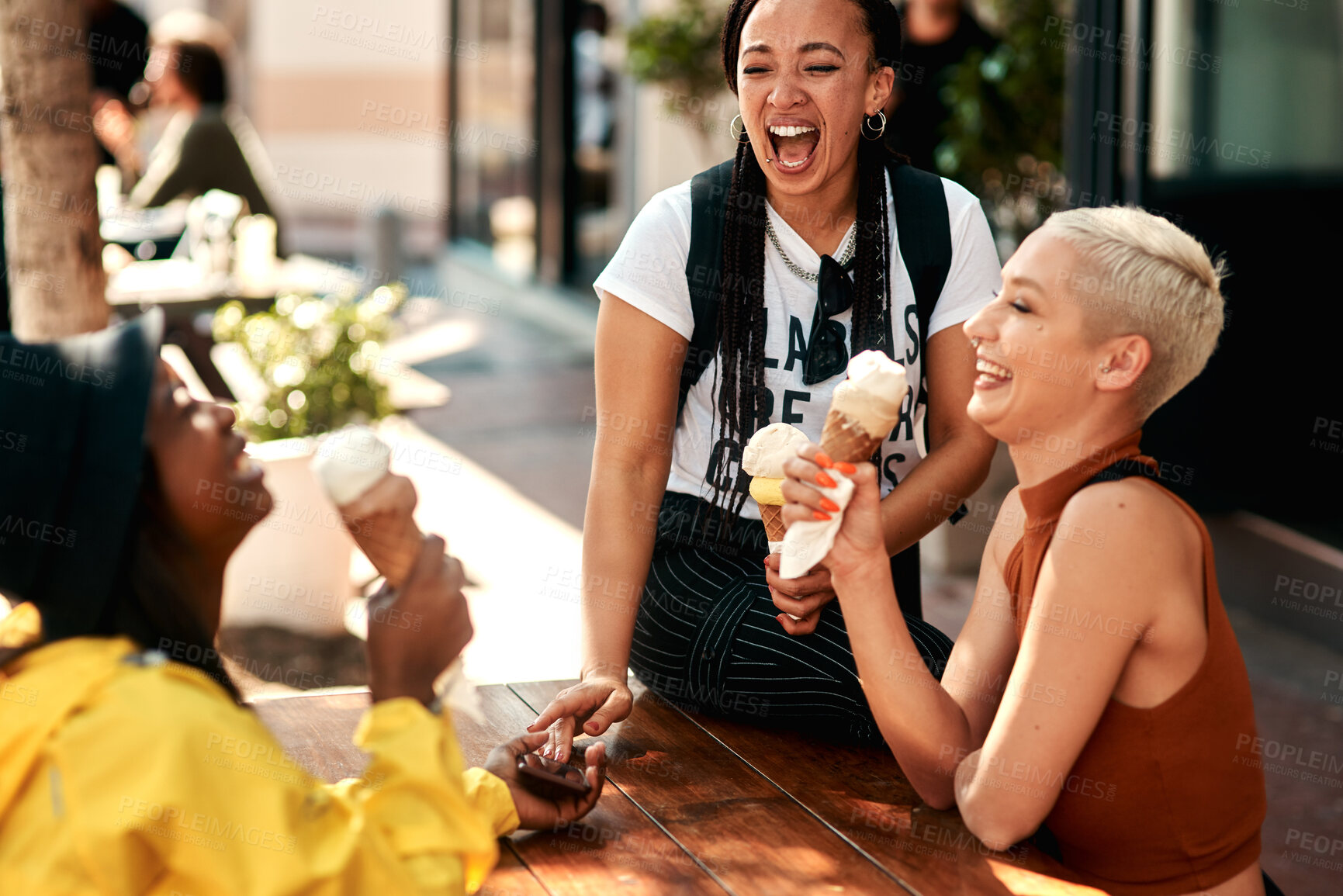 Buy stock photo Friends, women and laughing in city for ice cream with dessert, summer snack and funny conversation outdoor. Group, people and happy with cone for relax, bonding and comic gossip story in urban town