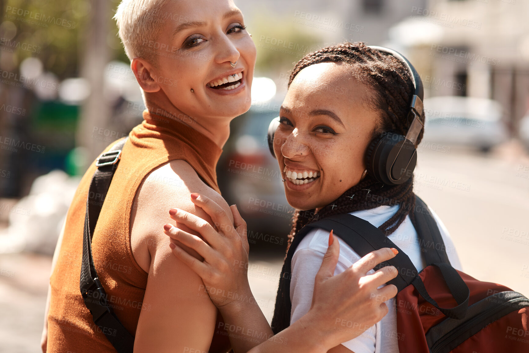 Buy stock photo Friends, girls and portrait in city with laughing for bonding, funny joke and streetwear with bags on sidewalk in road. People, women and face in town with edgy style, trendy clothes and confidence