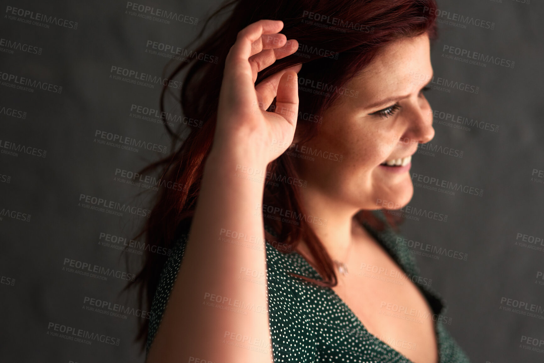 Buy stock photo Woman, thinking and smile at wall with memories, idea and nostalgia on dark background. Female person, creative inspiration and happiness with tattoo for peace, relaxation and relief in studio