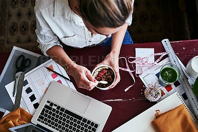 Buy stock photo Above, fashion designer and woman with laptop, tape measure and breakfast cup in atelier or design studio. Female tailor, dressmaker and tech for art, design or connection as creative in workshop