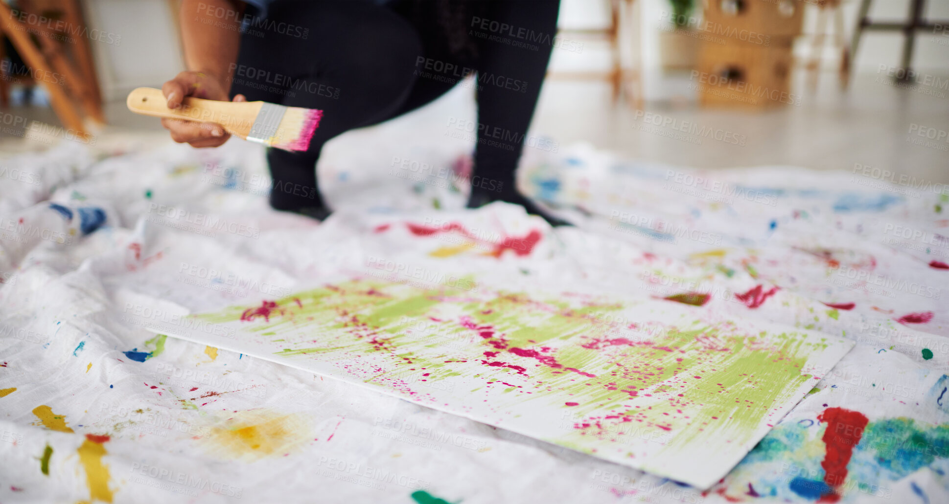 Buy stock photo Floor, mess and hands with paper, painting and artist with brush for artwork, creative and art. Home, person and watercolor for supplies, painter and talent in apartment, palette and inspiration