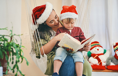 Buy stock photo Mother, boy and reading book at Christmas in home with listening, fantasy and care with Santa hat for celebration. Mom, child and happy with storytelling, bonding and hammock at xmas in family house