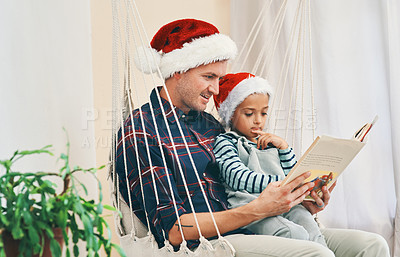 Buy stock photo Happy father, son and reading with book on Christmas day at home for story, novel or december. Dad bonding with young child, kid or little boy for fairytale, chapter or childhood on festive weekend