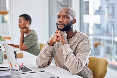 Buy stock photo Portrait of a confident businessman sitting at his desk