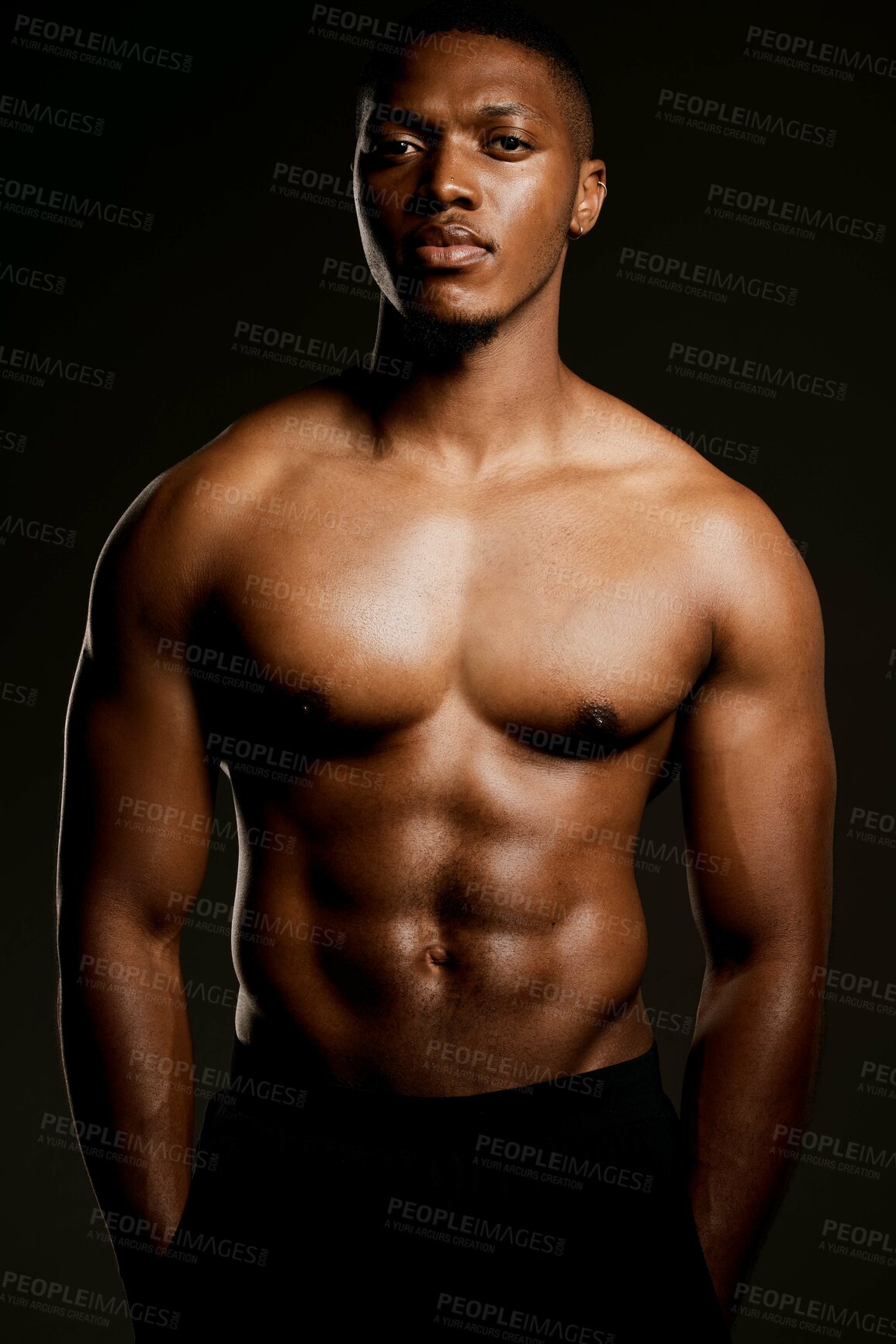 Buy stock photo Portrait, bodybuilder and African man with pride for fitness, health and body care in studio. Male athlete, confidence and muscles or abs by black background for wellness, training and results