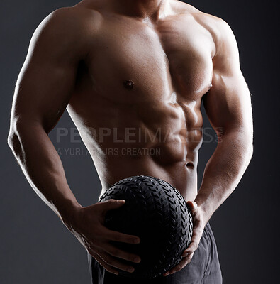 Buy stock photo Ball, hands or strong man in studio for bodybuilding workout, training or exercise for power or strength. Black background, fitness or topless athlete with equipment for sports challenge or wellness