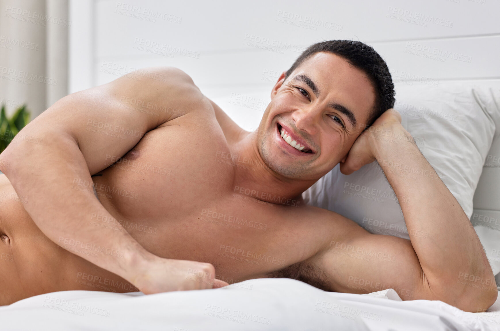 Buy stock photo Bedroom, portrait and man with smile, relax and health on bed, serious and thinking in morning. Home, muscle and fitness of body, abs and person in apartment, confidence and art on arm in house
