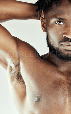 Buy stock photo Man, armpit and body wellness in studio, grooming and skincare with natural African with confidence. Serious, half and mode underarml for odour hygiene on white background, shitless and cosmetology