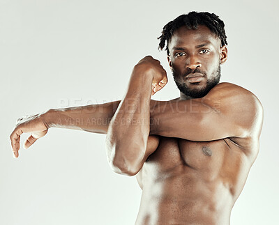 Buy stock photo Stretching arm, portrait and black man in studio for workout routine, wellness or performance on white background. Body, flexibility and male athlete for warm up, getting ready or fitness preparation