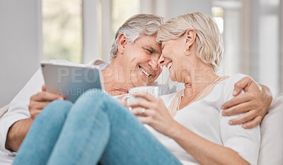 Buy stock photo Senior couple, tablet and love on sofa for relax, retirement and connection or online in home. Technology, elderly man and woman on couch for communication, streaming and watch movies in apartment