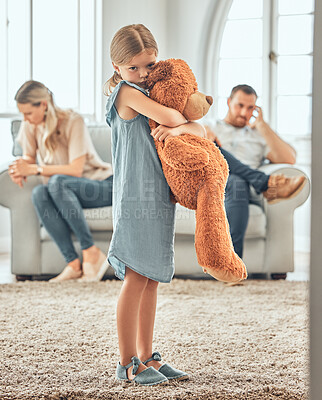 Buy stock photo Child, teddy and parents fighting in house, mental health and sad or depressed or parent separation or divorce. Security toy, comfort and home conflict with emotional distress, mom and dad in lounge