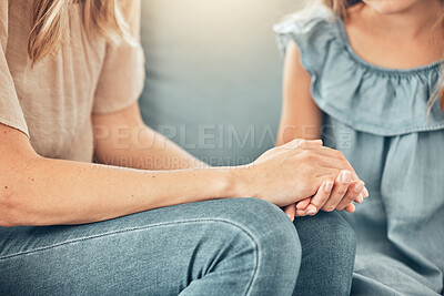 Buy stock photo Child, mother and hands for comfort on sofa, trust and caring for sensitive conversation. Adoption, discussion and foster child revelation in lounge, truth and confession with family understanding
