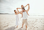 Playful family with adorable little daughter at the beach. Protective mom holding daughter on father's shoulders. Cheerful caucasian family traveling to beach during summer vacation 