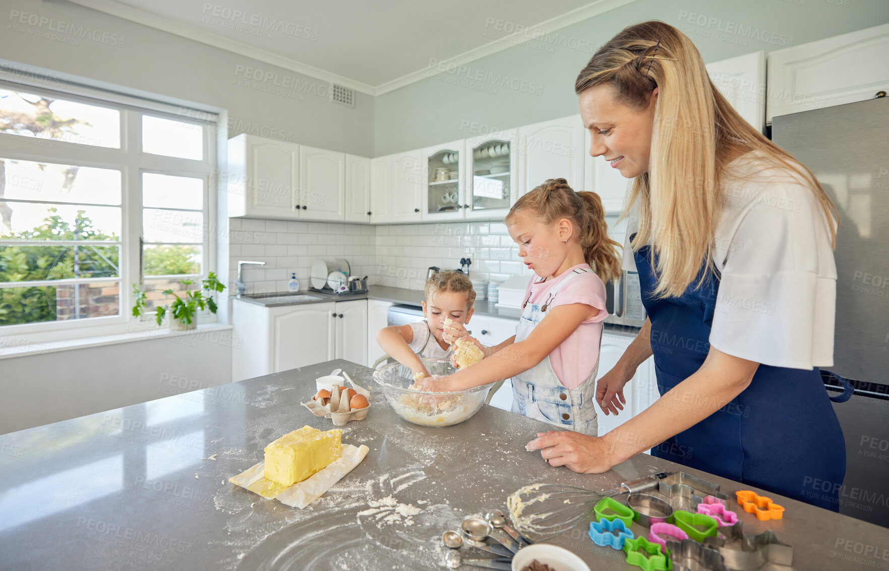 Buy stock photo Mom, teaching or happy family baking with children in kitchen for child development to prepare cookies in home. Smile, mother or kids siblings learning recipe for bonding, cooking or dessert for love