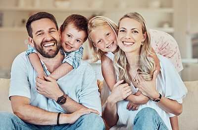 Buy stock photo Happy, family and portrait in home with hug for love, support and together for care in lounge. Parents, children and smile in living room for relax, pride and comfort on sofa for weekend and bonding