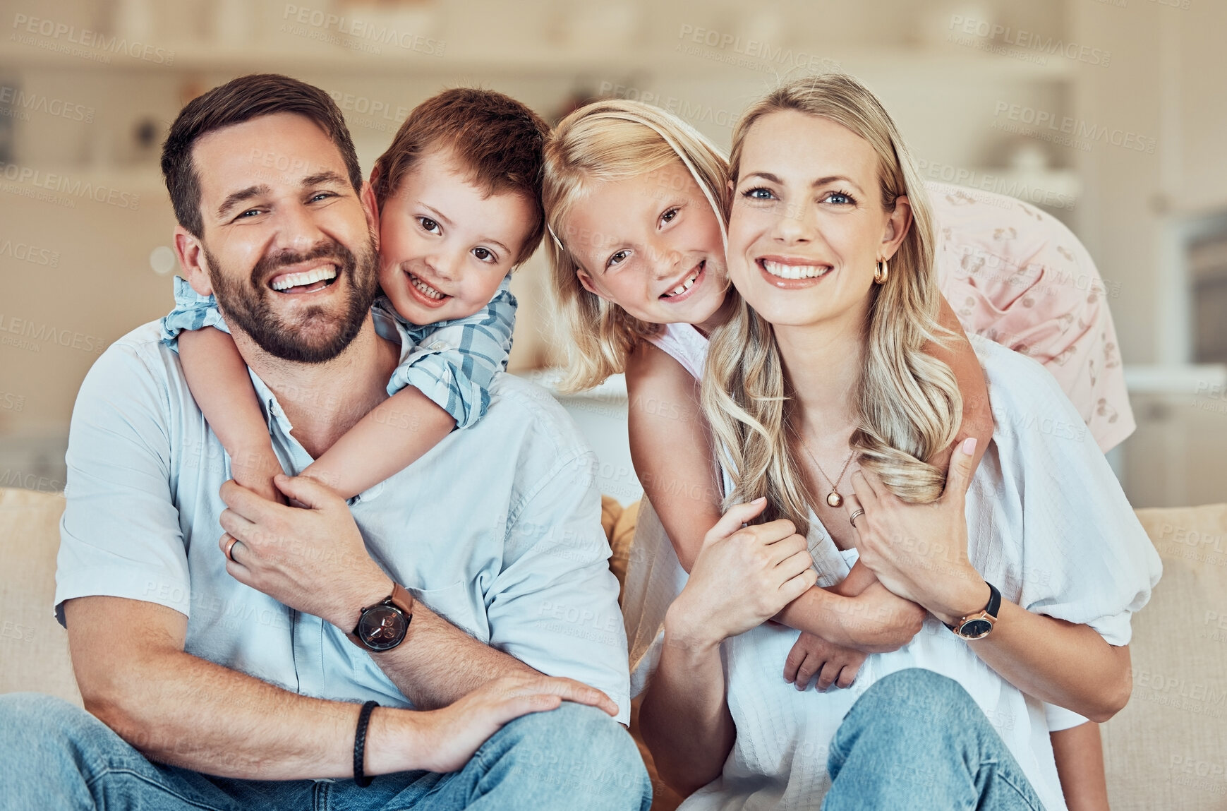 Buy stock photo Happy, family and portrait in home with hug for love, support and together for care in lounge. Parents, children and smile in living room for relax, pride and comfort on sofa for weekend and bonding