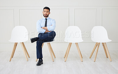 Buy stock photo Job interview, recruitment and man in waiting room for hiring, opportunity and thinking on chair. Annoyed, businessman and sitting with arms crossed for onboarding, vacant and delay in appointment