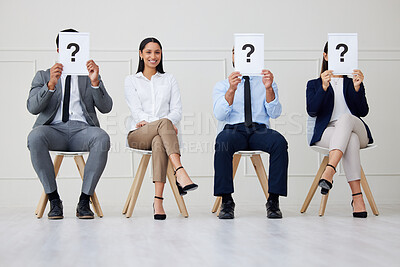 Buy stock photo Recruitment, poster and portrait of girl with team in waiting room for job interview, faq or information. We are hiring, question mark or business people at hr office with sign for onboarding steps
