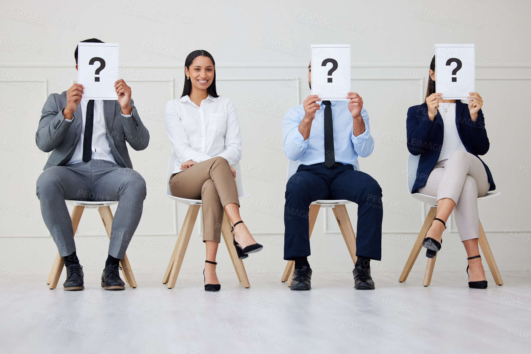 Buy stock photo Recruitment, poster and portrait of girl with team in waiting room for job interview, faq or information. We are hiring, question mark or business people at hr office with sign for onboarding steps
