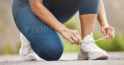 Buy stock photo Fitness, girl and hands for shoelace in outdoor for daily exercise routine, activity and training for marathon. Female runner, athlete on highway with tying laces for safety, prepare and workout.