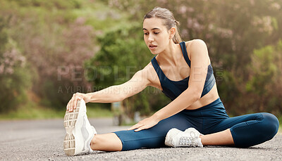 Buy stock photo Outdoor, woman and stretching leg for fitness, training and exercise for wellness with balance. Nature, road and female runner with warm up, preparation and getting ready for sports challenge