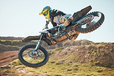 Buy stock photo Motorcross, air jump and offroad sports stunt, speed challenge and desert rally. Driver, cycling and freedom on dirt race, competition and motorbike performance on adventure course for fast action 