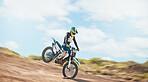 Motorcross, offroad driving and sports on sky for freedom. Driver, cycling and power on dirt track, motorcycle competition and motorbike performance on adventure course, fast action show and speed 