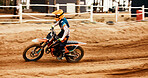 Motorcycle, fitness and motion blur with a sports man on space at an off road course for dirt biking. Bike, balance and power with a person driving fast during a race for freedom or performance