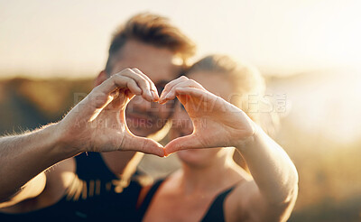 Buy stock photo Happy couple, love and nature with heart hands for care, embrace or romance in nature. Closeup of man and woman with like emoji, shape or gesture in outdoor forest for workout, exercise or fitness