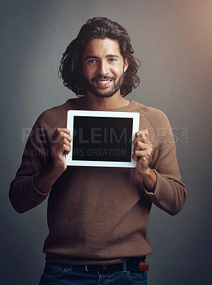 Buy stock photo Tablet, mockup and man in studio for internet, search or communication advertising on grey background. App, website and creative designer for online, portrait and project promotion isolated and space