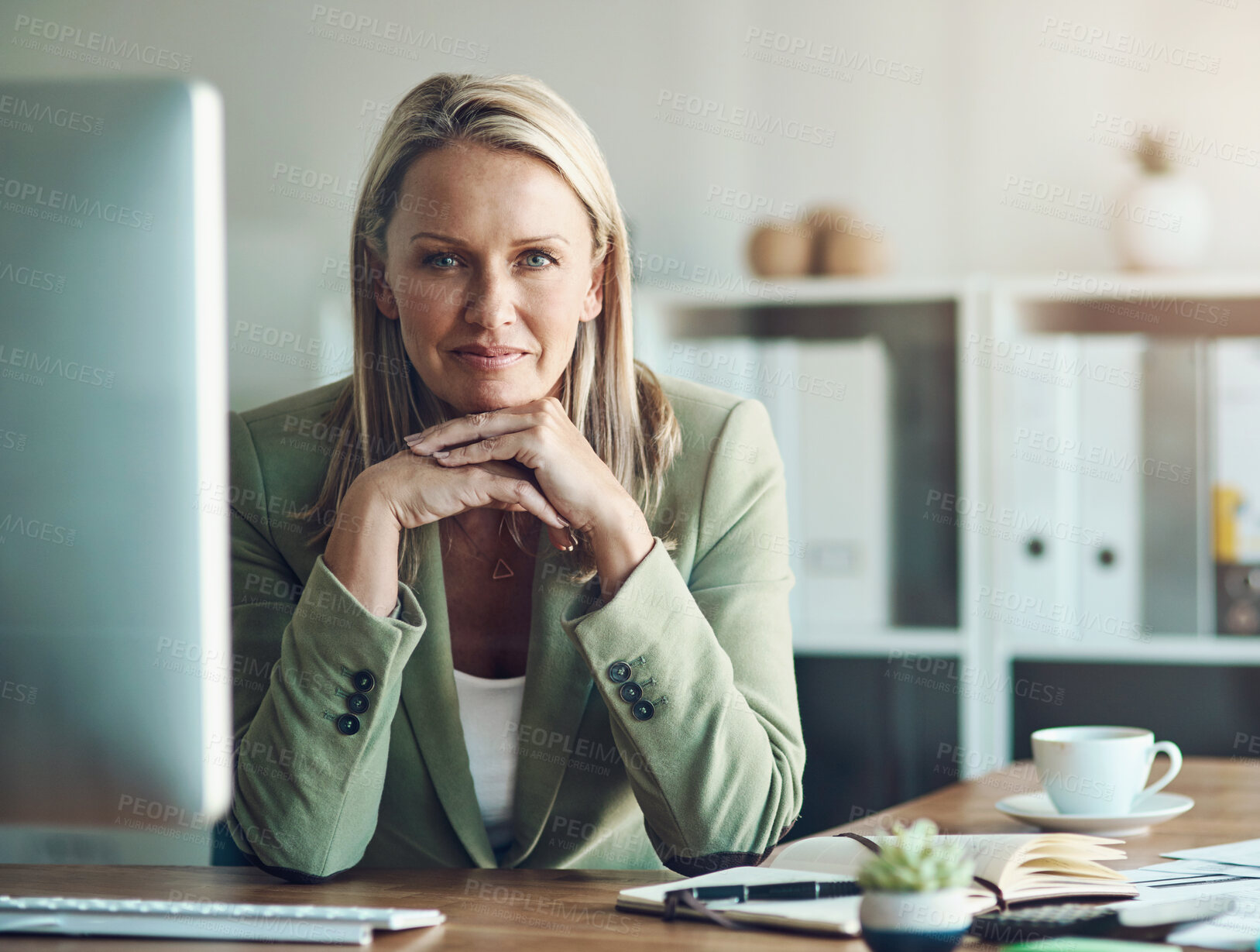 Buy stock photo Corporate, office and portrait of woman by desk for administration, company and pride in career. Happy, professional and person with monitor by desk for policy review, planning and morning schedule