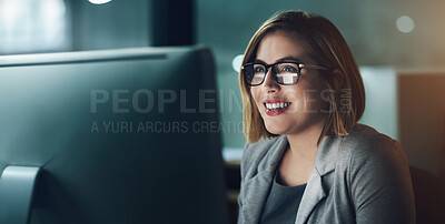 Buy stock photo Woman, employee and happy on computer in office for internet, online and research for ideas. Female person, smile and satisfied at night with deadline or overtime, project and glasses as copy writer