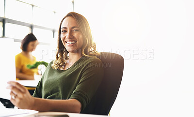 Buy stock photo Business woman, smile and portrait with paperwork at desk in office for creative startup company. Face, happy professional and document for graphic designer, entrepreneur or worker planning schedule