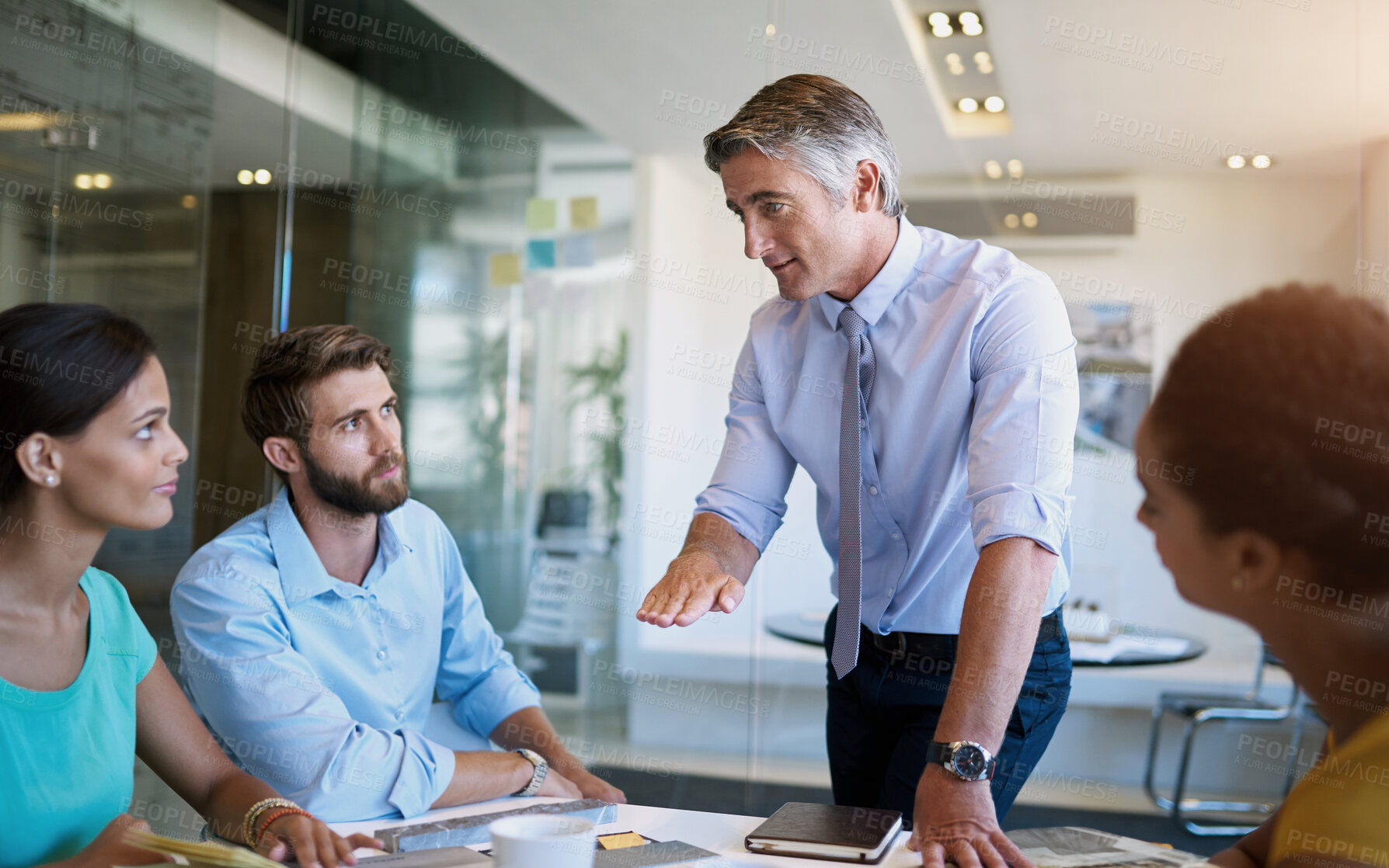 Buy stock photo Businessman, talking and staff in meeting office for planning, ideas and collaboration support of project pitch. Men, woman and discussion for brainstorming, feedback or teamwork of negotiation goal