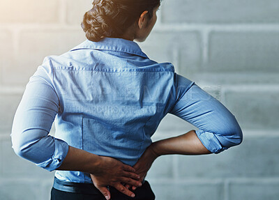 Buy stock photo Business, woman and stress with back pain by brick wall for muscle fatigue, tension and work injury. Corporate, professional and female person with problem in health for strain, sore or ache in spine