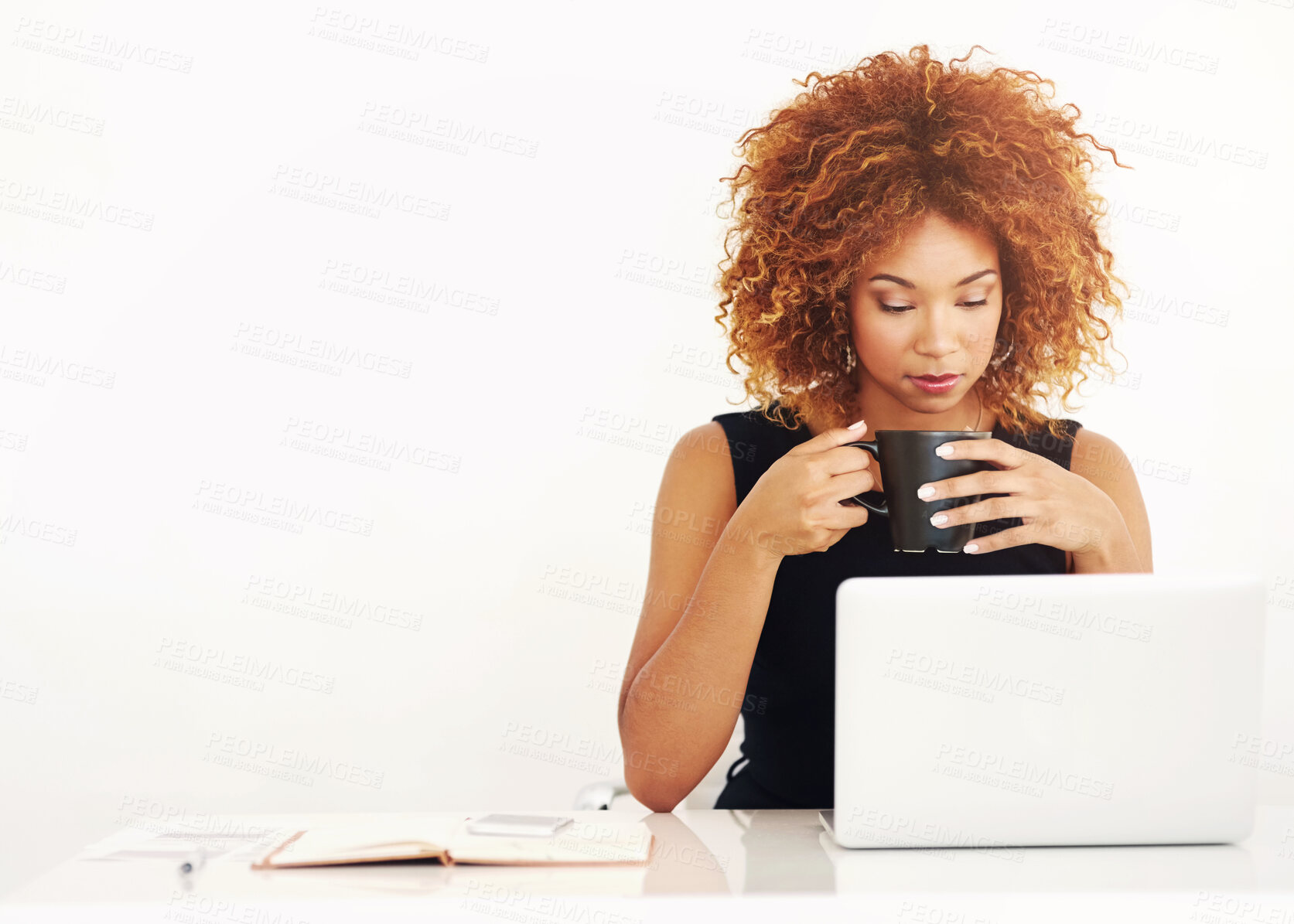 Buy stock photo African woman, laptop and coffee in studio by space for mock up with thinking by white background. Person, computer and drink in tea cup with reading, research or notebook for job at creative agency